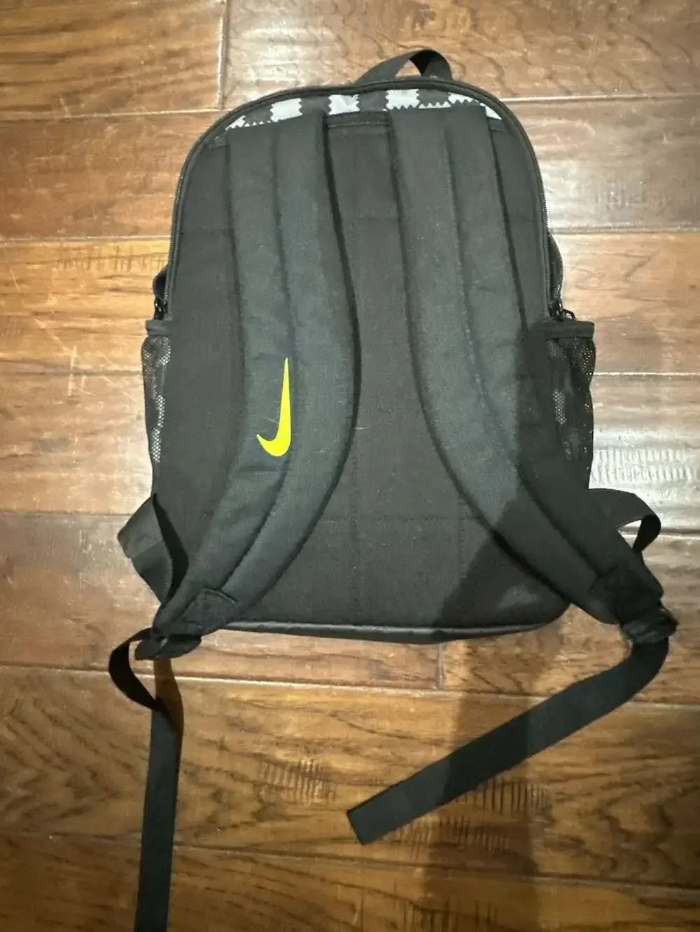 Nike Brasilia JDI Kids' Mini Backpack in Black/Grey Checkered with Volt Swoosh